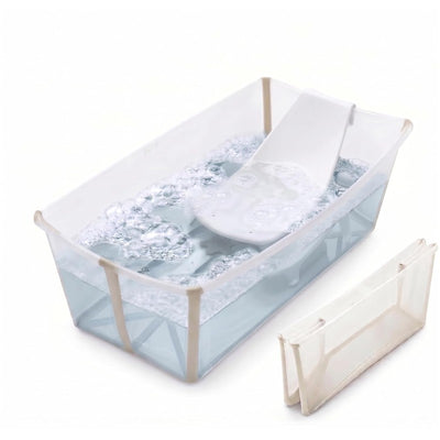 Flexi Bath Tub Bundle in Sandy Beige with water and a white support contour, includes a separate accessory.