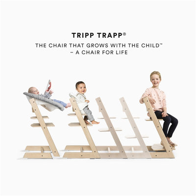 Stokke Tripp Trapp Classic Cushion in Nordic Grey on a high chair, showcasing three children using it at different stages.