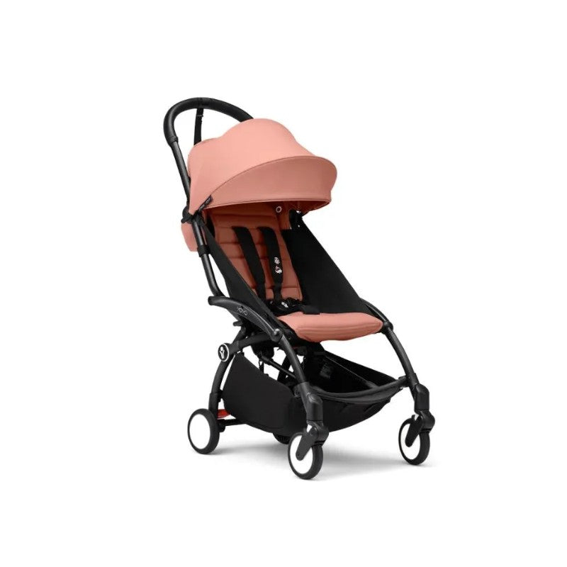 Stokke Yoyo³ Stroller 6+, featuring a black frame and ginger bundle leg rest, designed for children 6 months and older.