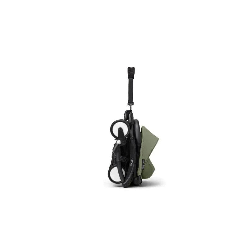 Stokke Yoyo³ stroller in black frame with olive bundle leg rest, shown in a folded position.