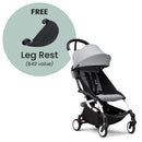 Stokke Yoyo³ stroller with white frame and stone fabric, featuring a free leg rest, highlighted as a $49 value.