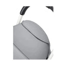 Stokke Yoyo³ stroller leg rest in light gray, showcasing the fabric texture and white frame.