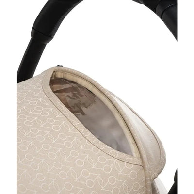 Beige stroller cover with a clear window, designed for the Stokke Yoyo³ stroller, showcasing texture and opening detail.