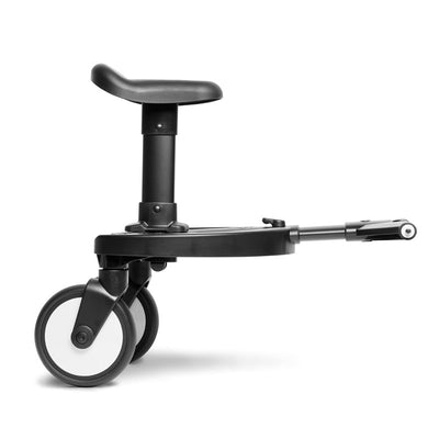 Stokke Yoyo® Board in black features a padded seat and two front wheels for easy maneuverability with a stroller.
