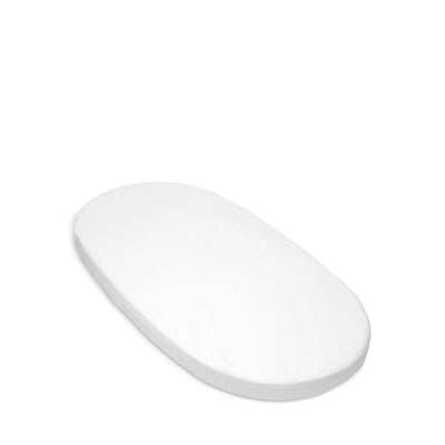 Fitted sheet for Stokke® Sleepi™ Bed made of organic cotton, featured in a plain white color.