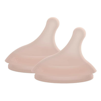 Suavinex 2Pk Zero.Zero™ slow flow asymmetrical nipples in a soft pink color, designed for infants 0 months and older.