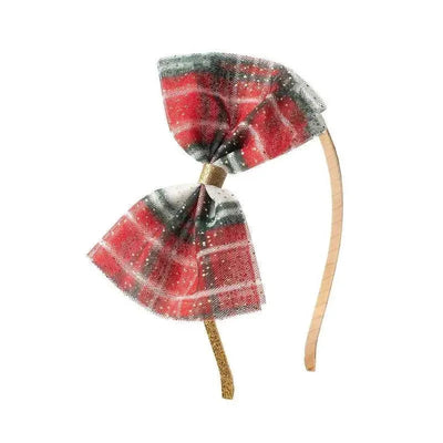 Christmas plaid bow headband featuring a red, green, and white plaid bow on a tan headband with a gold accent.