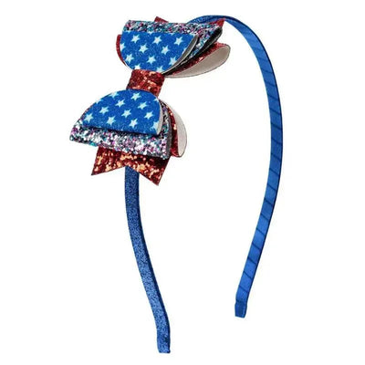 Red, white, and blue bow headband featuring stars and glitter for 4th of July celebrations.