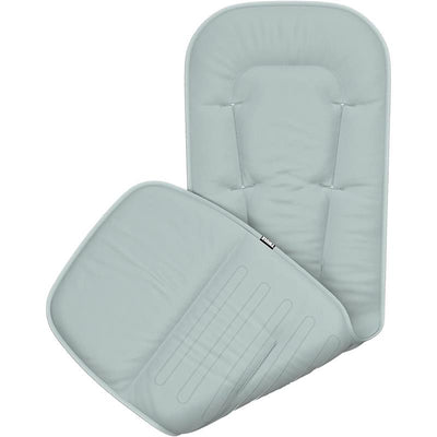 Stroller seat liner in light gray with cushioning, designed for Thule strollers, featuring adjustable straps for secure fit.