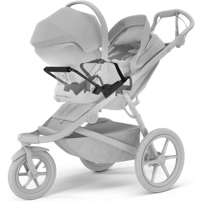 Thule Urban Glide 3 car seat adapter in black, attached to a stroller, designed for universal use with Chicco car seats.