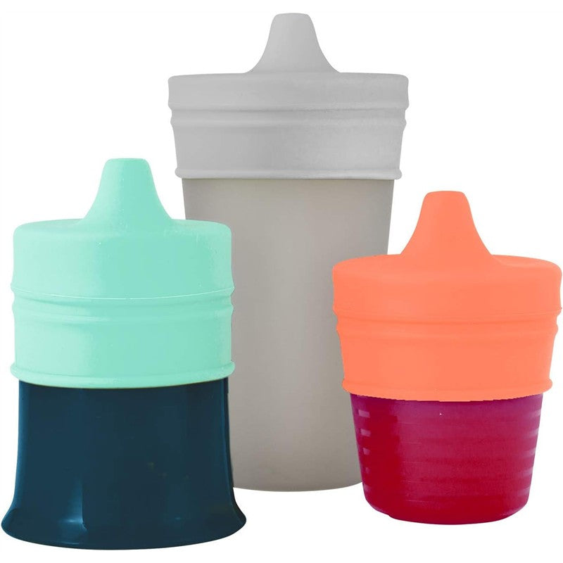 Boon SNUG Spout Sippy Cups in various colors: mint green, gray, coral, and dark blue, designed for easy drinking for toddlers.