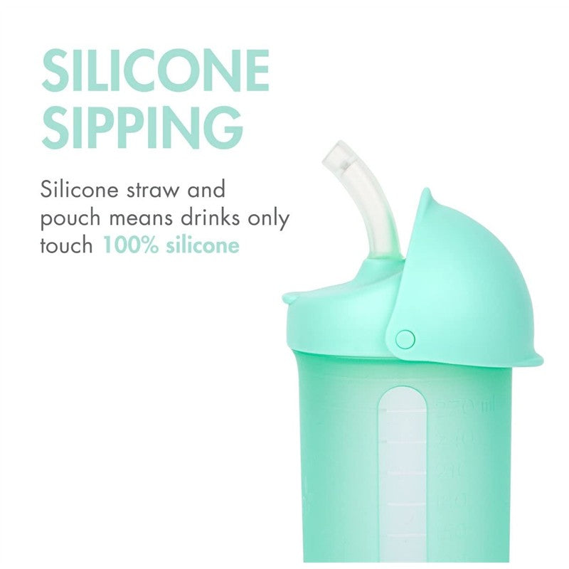 Boon SWIG silicone straw cup in mint color, featuring a soft silicone straw and pouch, promotes 100% silicone sipping.
