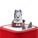 Tonies Bluey audio toy figurine set featuring Bluey reading a book, on a red audio player with colorful activity buttons.