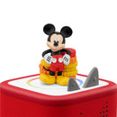 Mickey Mouse figurine sits atop a red audio toy block, featuring colorful stacking rings and buttons for play.