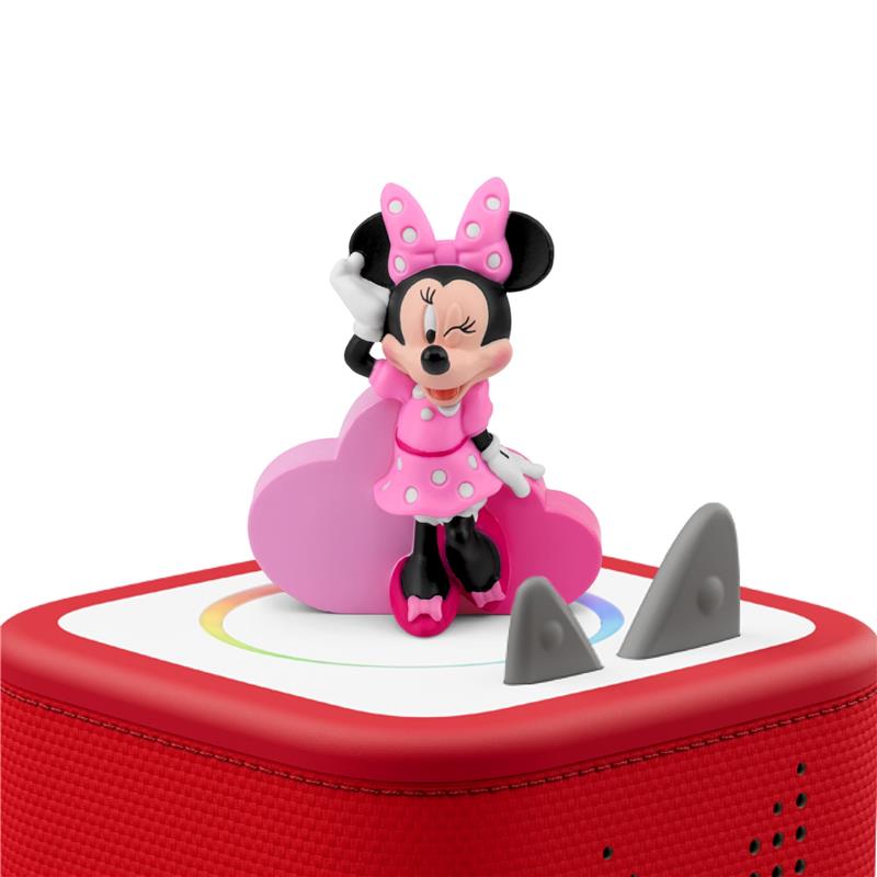 Minnie Mouse figurine dressed in a pink dress with polka dots, sitting on a cloud atop a red audio toy.
