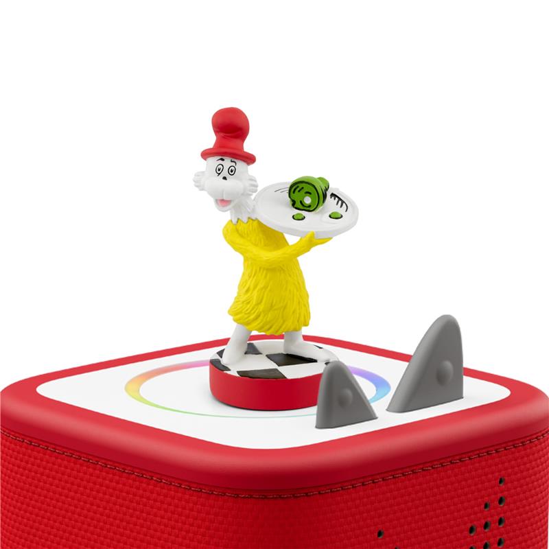 Tonies Sam-I-Am audio play character features a cartoonish figure in a yellow outfit holding a plate of green eggs and ham.