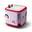Decorative wrap for Toniebox 2 featuring a playful rainbow design on a purple background with multicolored dots.