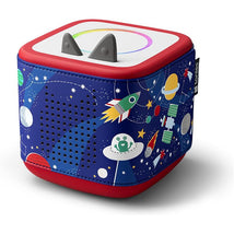 Decorative wrap for Toniebox 2 featuring a space theme with rockets, planets, stars, and a playful frog design.
