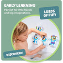 Child playing with Toomies Bluey Bath Puzzle, interacting with colorful character pieces in a bubbly bath setting.