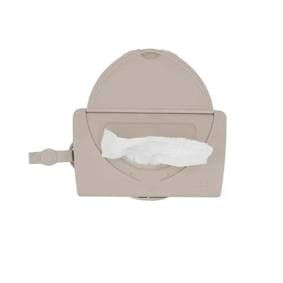Portable taupe baby wipes dispenser from Ubbi, featuring a soft wipe partially exposed for on-the-go convenience.