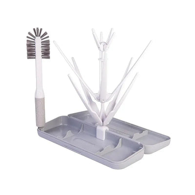 Ubbi On-The-Go Drying Rack in grey, featuring a detachable base and multiple drying arms for efficient bottle drying.