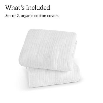 Set of 2 soft, organic cotton mattress covers for UPPAbaby Remi V2 Playard, shown folded.