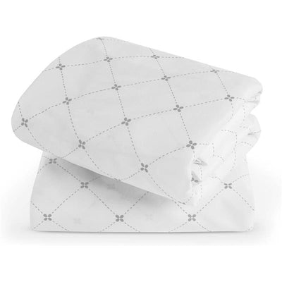 Waterproof UPPAbaby mattress covers for Remi V2 Playard, featuring a white fabric with grey dotted pattern.