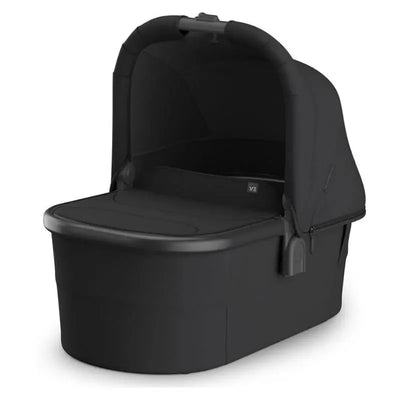 Uppababy Bassinet V3 in charcoal with carbon frame, featuring a sleek design and protective canopy.