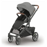 Uppababy Cruz V3 stroller in Charcoal Mélange with carbon frame and saddle leather handle, featuring a modern design.