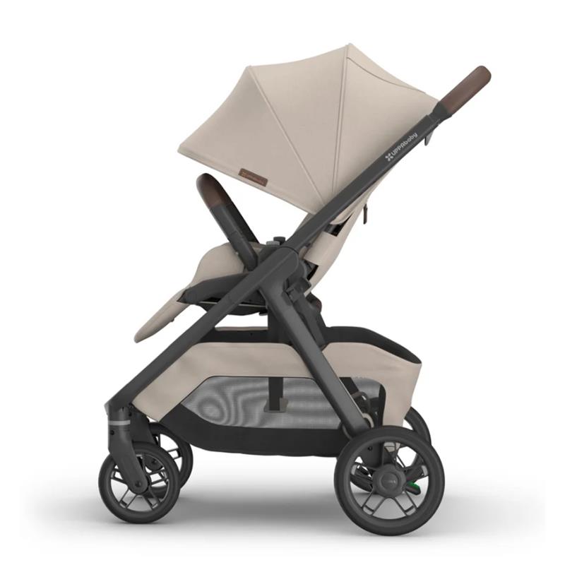 Uppababy Kona Stroller in Sandstone Mélange, featuring a large canopy, cushioned seat, and ample storage below.