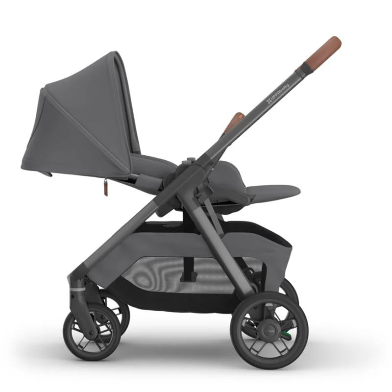 Uppababy Kona Stroller in Rowan (Graphite) with adjustable canopy, padded seat, and under-seat storage basket.