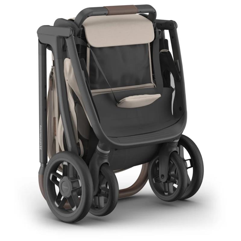 Uppababy Kona Stroller featuring a sandstone mélange fabric with a streamlined design and four wheels for easy mobility.