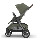 Uppababy Kona Stroller & Bassinet V3 Bundle in Meadow Green with a reclining seat and large canopy.