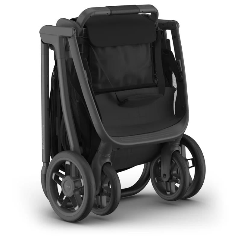Uppababy Kona Stroller in black, with a sleek design and spacious seat, featuring large wheels for easy maneuverability.
