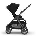 Uppababy Kona Stroller & Bassinet V3 Bundle in black, featuring a large canopy, padded seat, and spacious storage basket.