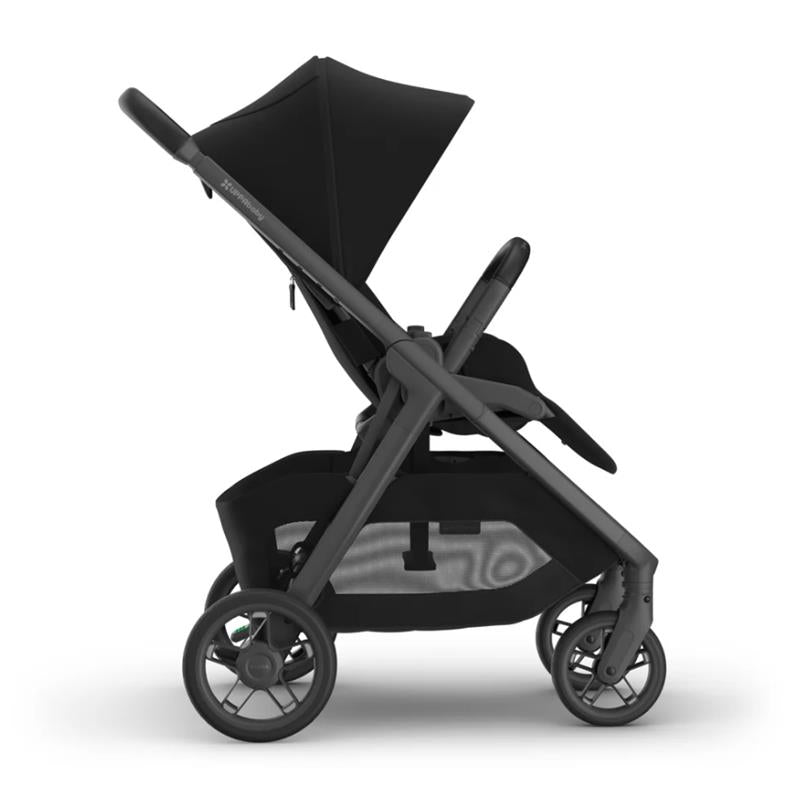 Uppababy Kona Stroller & Bassinet V3 Bundle in black, featuring a sleek design with a large canopy and comfortable seating.