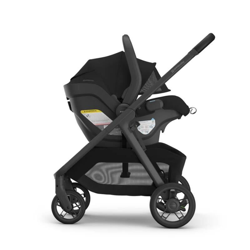 Uppababy Kona Stroller & Bassinet V3 Bundle in black, featuring an infant car seat and a sleek frame design.