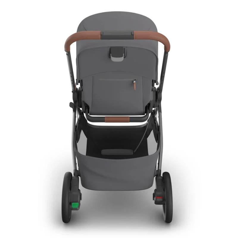 Uppababy Kona stroller in Rowan (Graphite) color, featuring a spacious seat, brown handlebar, and undercarriage storage.