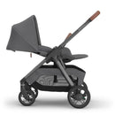 Uppababy Kona Stroller & Bassinet V3 Bundle in Rowan (Graphite) with a dark gray design and leatherette handle.