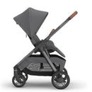 Uppababy Kona Stroller in Rowan color, featuring a graphite frame, large sun canopy, and sleek design.