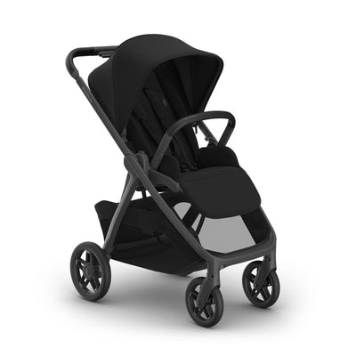Uppababy Kona stroller in black with a carbon frame and black leather accents, showcasing a sleek and modern design.