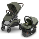 Uppababy Kona stroller in meadow green with a brown handle and Mesa V3 infant car seat in matching color.