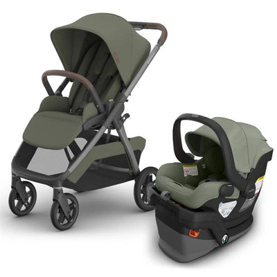 Uppababy Kona stroller in meadow green with a brown handle and Mesa V3 infant car seat in matching color.