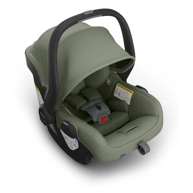 Uppababy Mesa V3 infant car seat in Meadow Green, featuring a removable canopy and secure harness system.