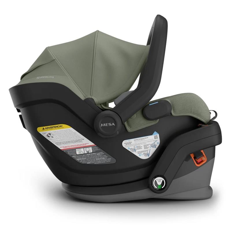 Uppababy Mesa V3 Infant Car Seat in Evelyn (Meadow Green) with a black base and safety instructions visible on the side.