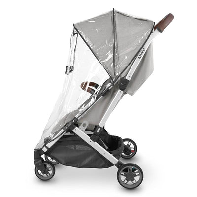 Rain shield for Uppababy Minu/Minu V2 stroller, featuring a clear cover and a sleek, compact design.