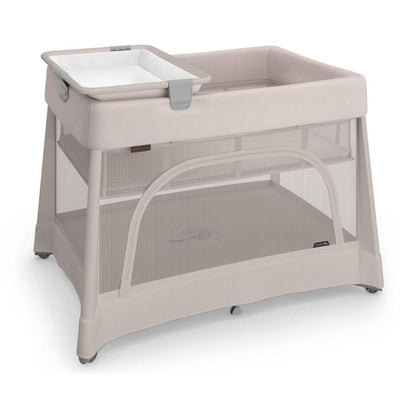 UPPAbaby Remi V2 Playard in Townsend Beige Soft Knit with removable changing table and mesh sides for airflow.