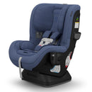 UPPAbaby Rove Convertible Car Seat in Cody color, featuring plush cushioning, safety harness, and side impact protection labels.
