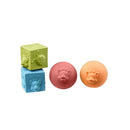 Vulli Sophie La Girafe So’Pure Cubes & Balls set with two balls and two blocks, featuring playful shapes and colors.