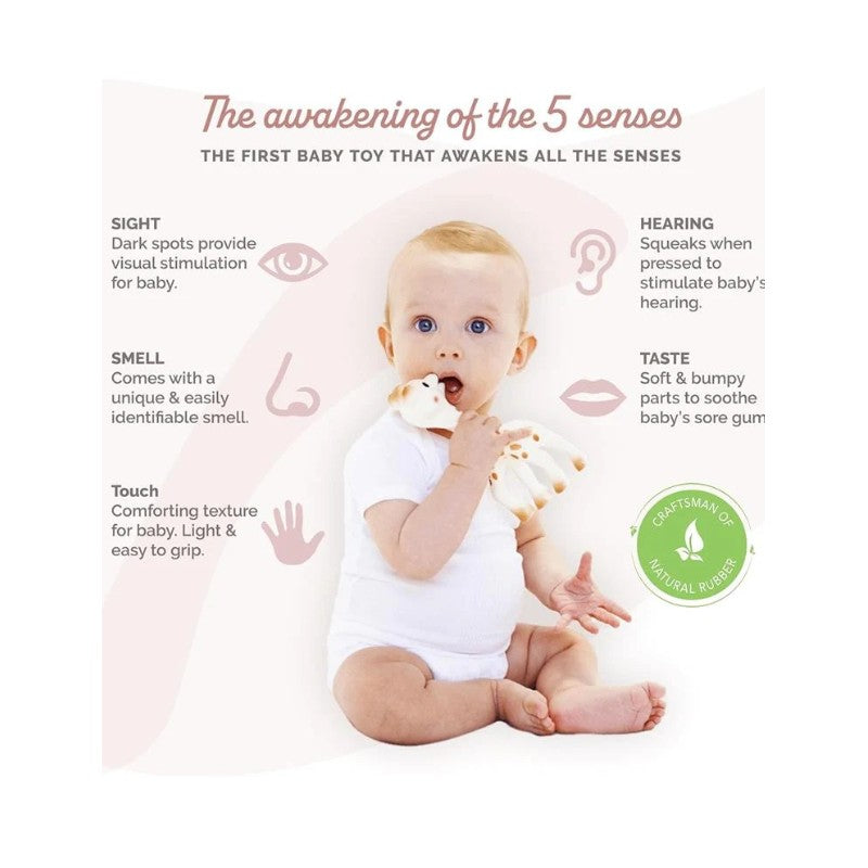 A baby sitting with a Vulli Sophie La Girafe teether, showcasing sensory features like sight, sound, smell, touch, and taste.